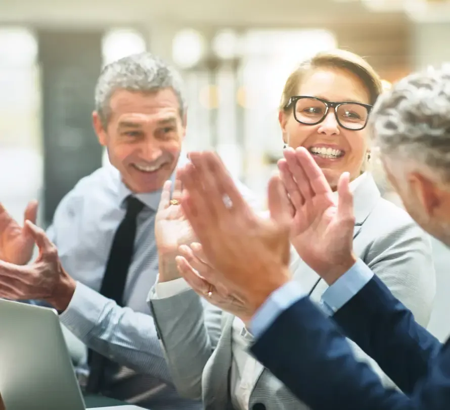 An Australian business team celebrating a business award win